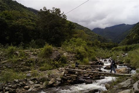 Me crossing the Amazon river in Baños, Ecuador – Christopher Scott