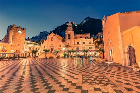 Illuminated Evening View of Taormina Town, IX Aprile Plaza with San Giuseppe Church and Old ...