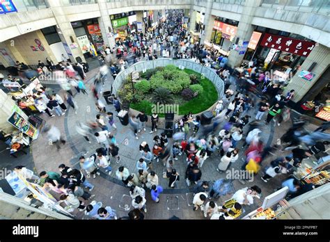 Aerial photo shows people shopping in the largest night market in Sijing Town, Songjiang ...