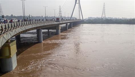 See pics: Yamuna flows above danger mark in Delhi | Mint Primer