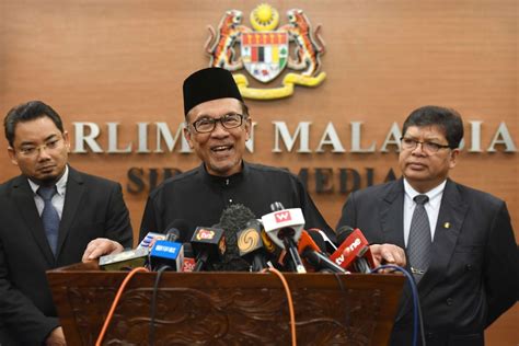 Malaysian PM-in-waiting Anwar takes oath as lawmaker