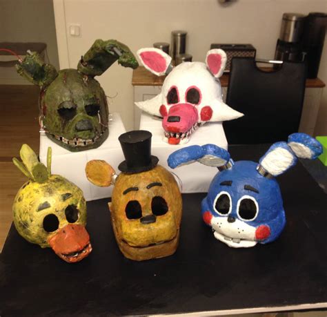 Our FNAF masks by art-by-AnnaSandgren on DeviantArt