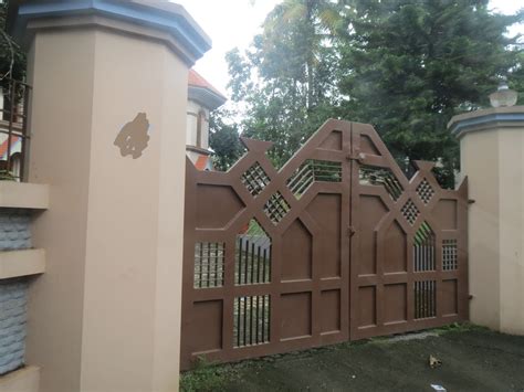 Kerala Gate Designs: Gate with heavy works in Kerala