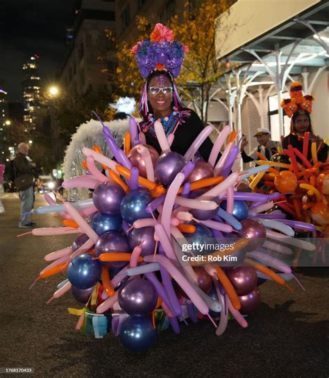 Parade goers in costume attend the 2023 New York City Halloween... News ...