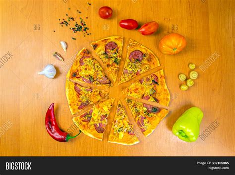 Pizza Cut Into Pieces Image & Photo (Free Trial) | Bigstock