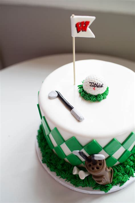 Golf theme grooms cake covered in fondant with fondant golf club, golf bag, and fondant golf ...