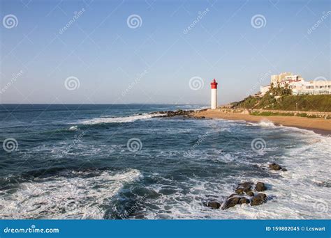 The Lighthouse at Umhlanga Overlooked by Buildings Stock Image - Image ...