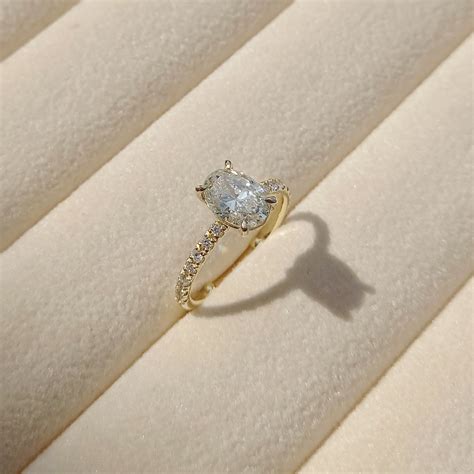 Oval Cut Solitaire Melee Diamond Ring | Engagement Ring