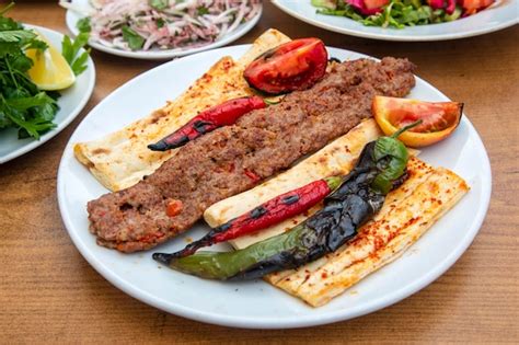 Premium Photo | Turkish style Adana Kebab. Traditional Turkish Food ...