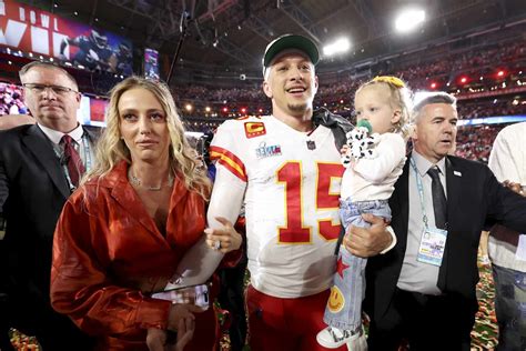 Patrick Mahomes Celebrates Super Bowl Victory with Trophy, WWE Belt