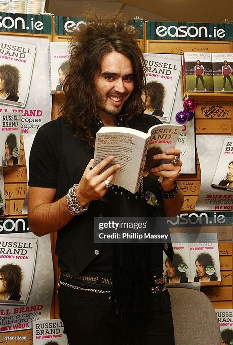 Russell Brand signs copies of his book "My Booky Wook" in News Photo Getty Images