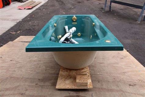 Whirlpool style tub w/pump - Lee Real Estate & Auction Service