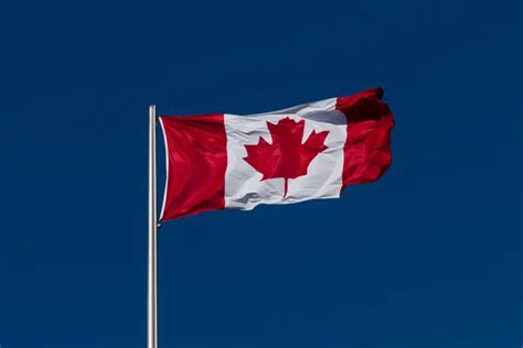 Canadian flag waving in the wind — Stock Photo © pandionhiatus3 #24224161