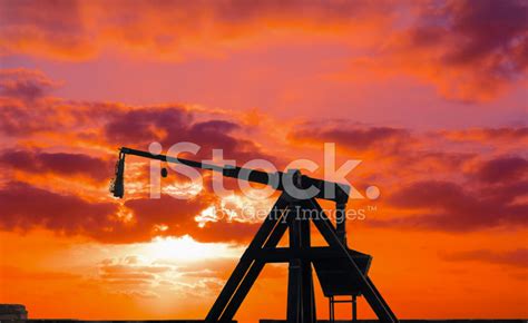 Catapult Silhouette Under A Red Sunset Stock Photo | Royalty-Free | FreeImages