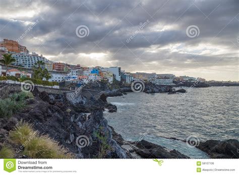 Cloudy Weather in Coastal Resort Town Puerto De Santiago Stock Photo - Image of cityscape, cliff ...