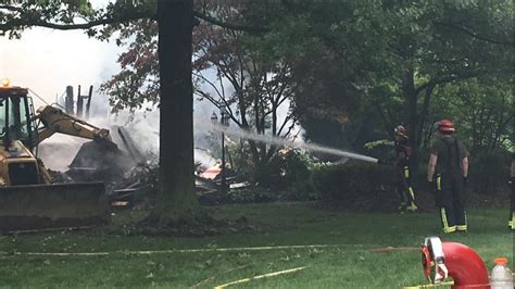 PHOTOS | Crews battle house fire in Eaton Township | wkyc.com