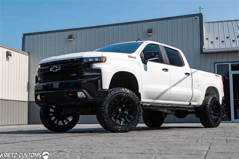 Lifted 2019 Chevy Silverado 1500 with 6 Inch Rough Country Suspension Lift Kit and 22×12 Fuel ...