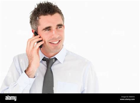 Happy man making a phone call Stock Photo - Alamy