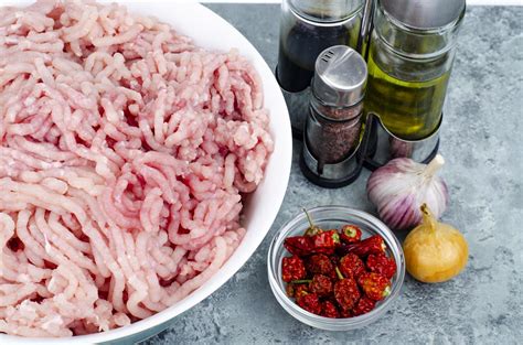 Plate with fresh minced meat, spices for cooking. Studio Photo 5327374 Stock Photo at Vecteezy