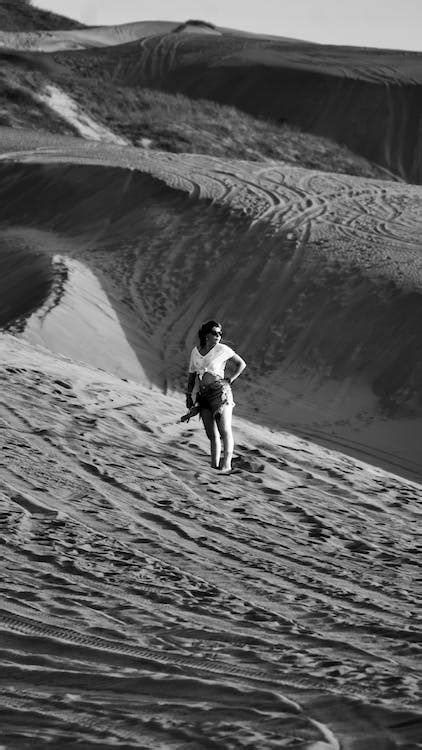 Hiker on Sand Dune · Free Stock Photo