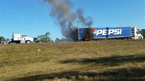 Pepsi truck fire shuts down I-75 SB near Luckett Road