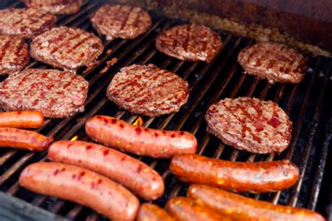 Barbeque Grill With Hamburgers Hot Dogs And Sausage Stock Photo ...