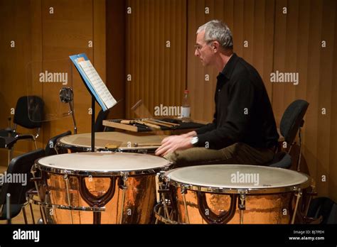 Timpani player in an orchestra rehearsal practice Stock Photo - Alamy