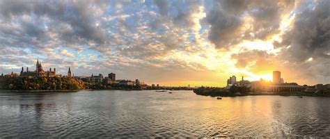 A broad view of the Ottawa River in Ottawa, Ontario. To the left is ...