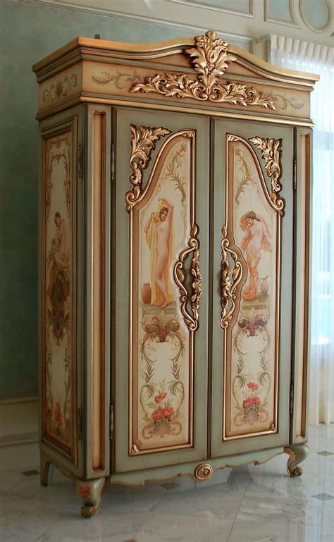 hand-painted 'french armoire' with goldleaf gilding, panels featuring ...