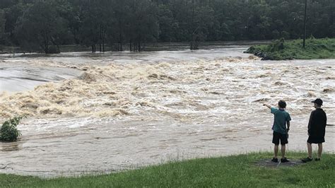 Gold Coast weather: Severe storm warning issued as schools close, roads ...