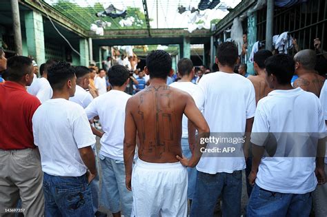 Members of the 18th street gang gather in the yard of the... News Photo ...