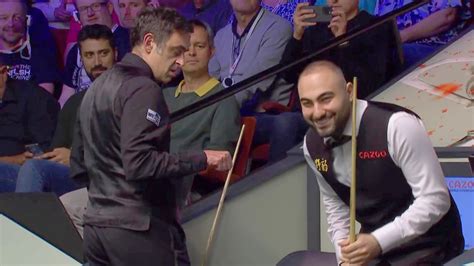 Ronnie O’Sullivan and Hossein Vafaei share 'slightly icy' fist bump ...