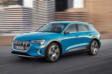 2019 Audi E-tron electric SUV revealed, begins 12-car EV surge ...