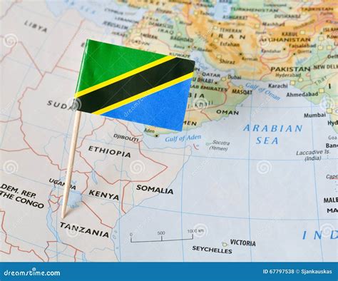 Tanzania flag pin on map stock photo. Image of concept - 67797538