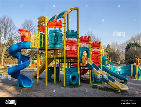 Colorful children playground park. Children's slides and playground made of plastic material ...