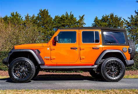 Orange JL Wrangler Jeep — Dreamworks Motorsports