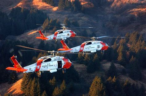 Coast Guard MH-60 Jayhawk helicopters from Air Station Kodiak fly in ...