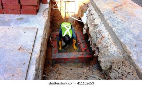 Worker Uses Engineering Bricks Together Waterproof Stock Photo ...