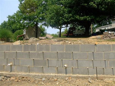 Concrete Block Retaining Wall | Cinder block walls, Concrete retaining walls, Concrete block ...