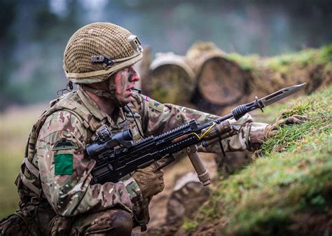 Fix bayonets! - A paratrooper from C Coy 3 PARA steels himself for the final clearance of an ...