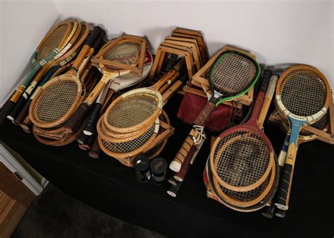 #143: A LARGE COLLECTION OF TENNIS RACKETS