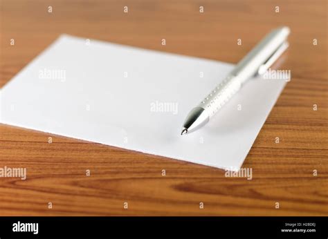 pen with white paper Stock Photo - Alamy