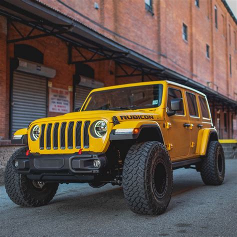 Style and Attitude! . 📸: David Acevedo . . Lifted Yellow Jeep Wrangler ...