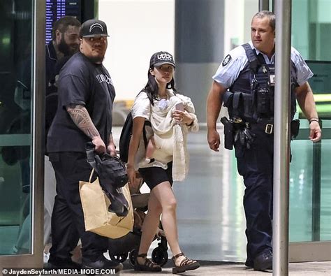 Post Malone touches down in Sydney with girlfriend and baby daughter ...