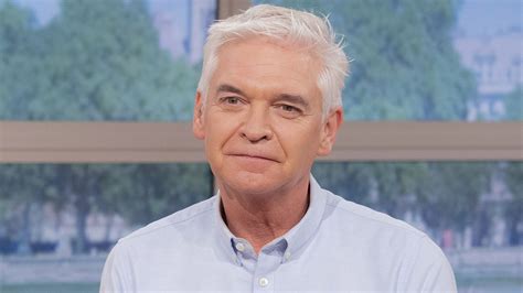 Phillip Schofield breaks down in tears during emotional moment with Kelly Holmes about coming ...