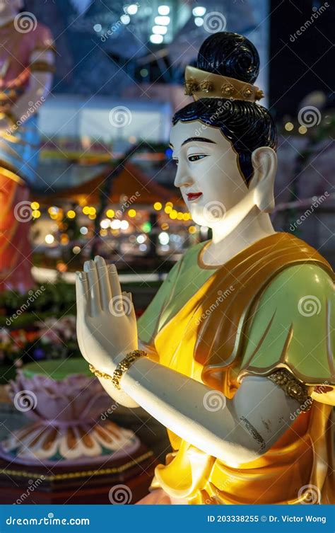 Buddhist Statue in Prayer Posture at the Buddhaâ€™s Day Multicultural ...