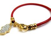 Items similar to Kabbalah red string 14k gold plated hamsa zircon charm bracelet for good luck ...