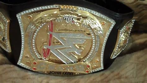 WWE COMMEMORATIVE SPINNER CHAMPIONSHIP BELT VS. ADULT SIZE REPLICA REVIEW & COMPARISON - YouTube