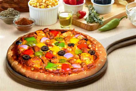 Order Maharaja Veg Pizza 11 Inch online from Ovenstory