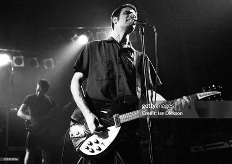 Guy Picciotto of Fugazi performing on stage, Kilburn National... News ...